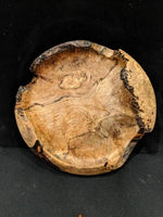 Maple burl natural edge hand-turned bowl.