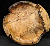 Maple burl natural edge hand-turned bowl.