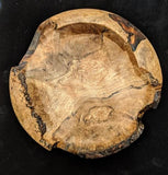 Maple burl natural edge hand-turned bowl.