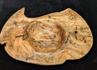 Maple burl natural edge hand-turned bowl.